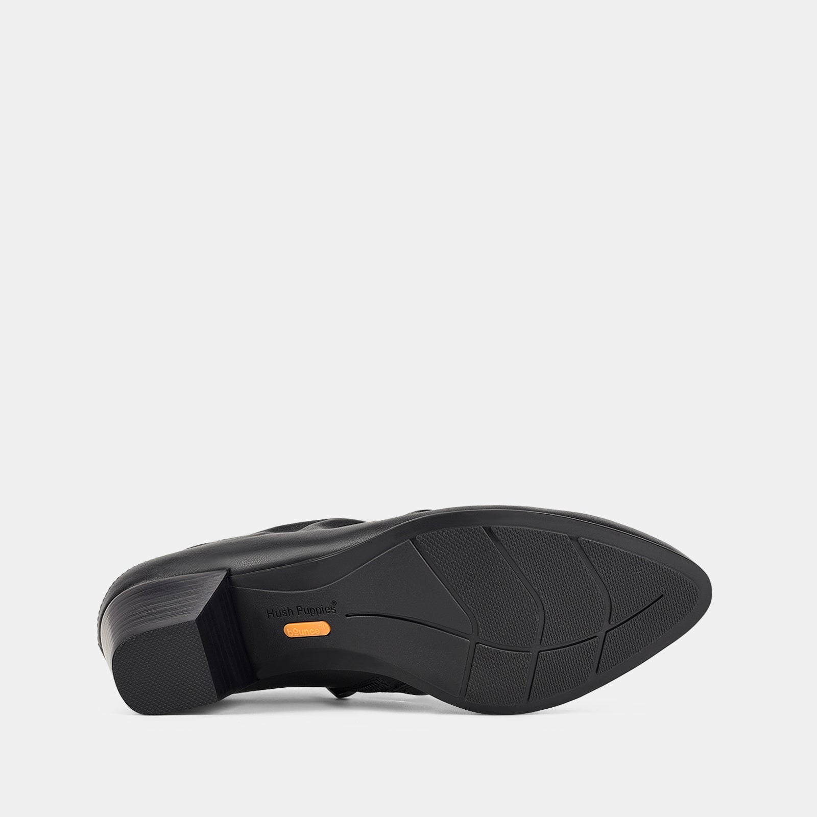 Black shoe sole on a light gray background