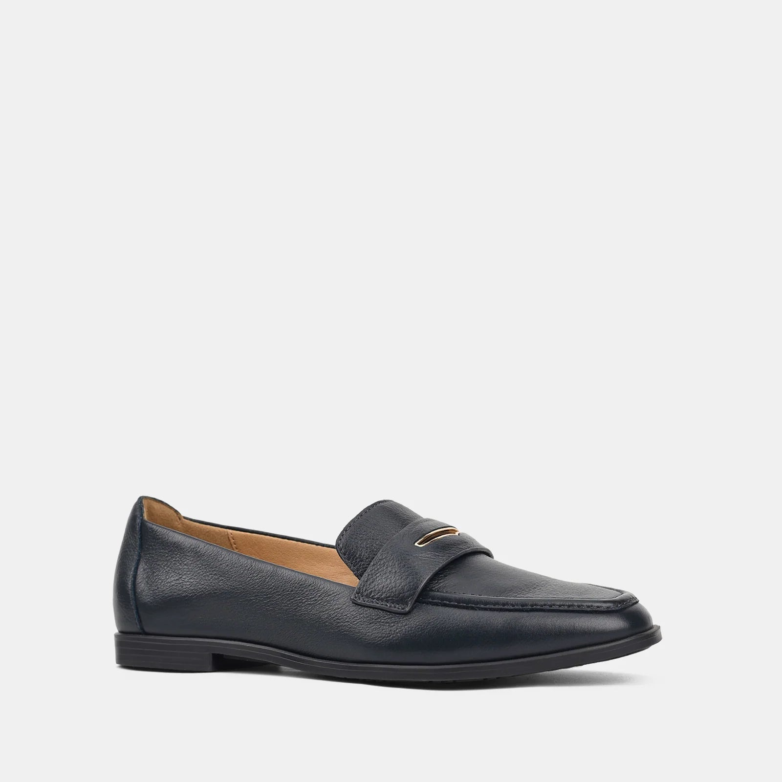 Black loafer shoe on a light gray background