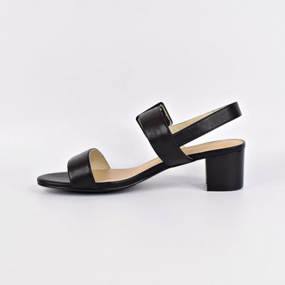 Brandi Black by Chrissie | Womens Heels by white back drop adjustable over the foot strap