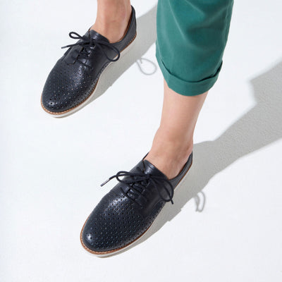 Danae Black by Hush Puppies| Womens work shoes by white back drop patterned phylon outsole providing flexibility