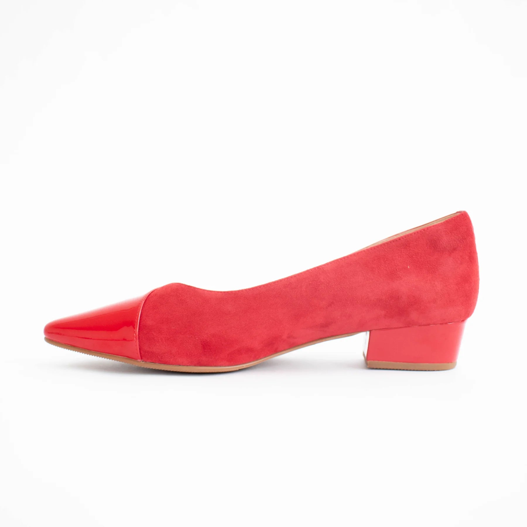 Red suede shoe on a white background