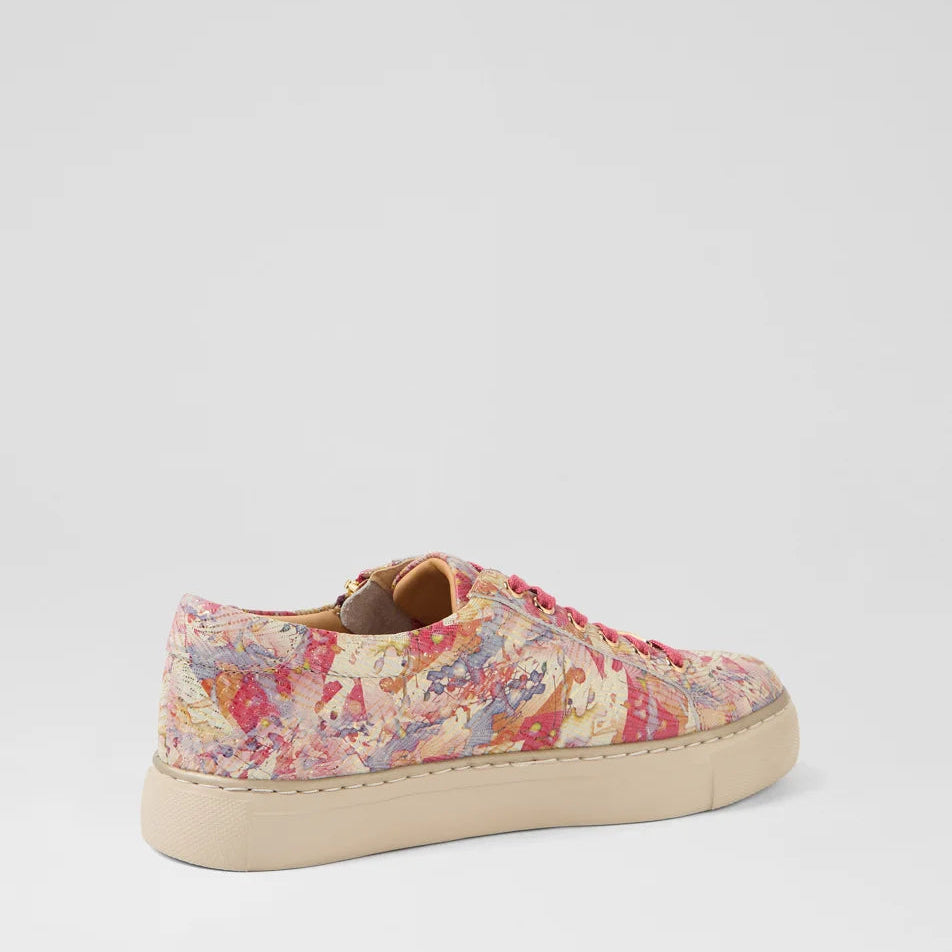 Floral patterned sneaker on a light gray background