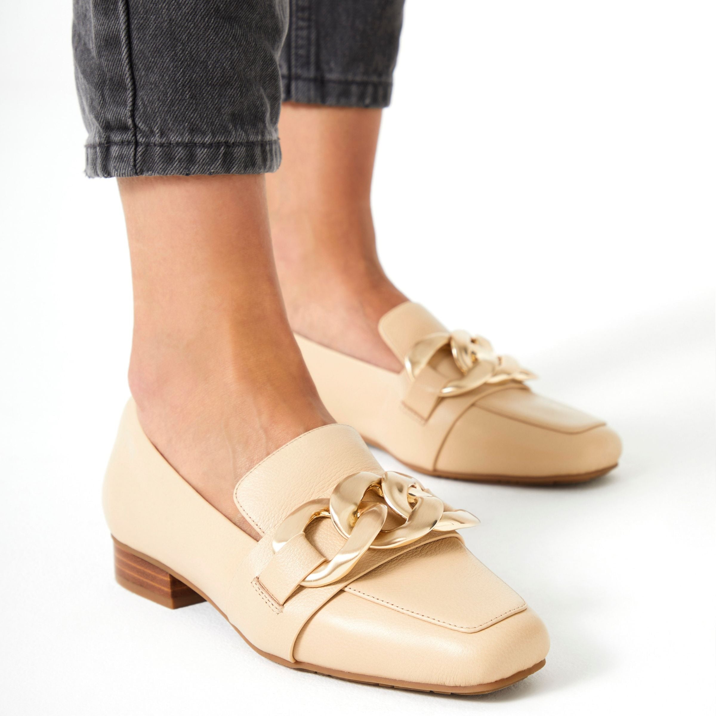 Sevilla Latte by Hush Puppies| Womens work shoes by white back drop all day wear comfort