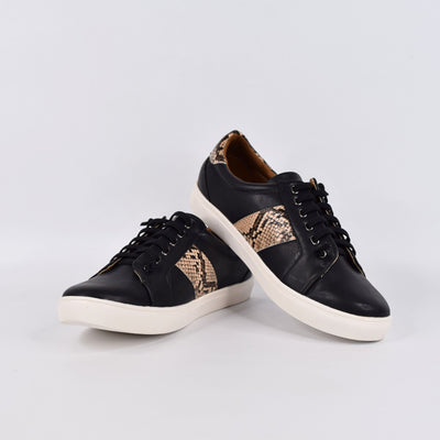 Skale Black Snake by Step on Air | Womens sneakers by white back drop 