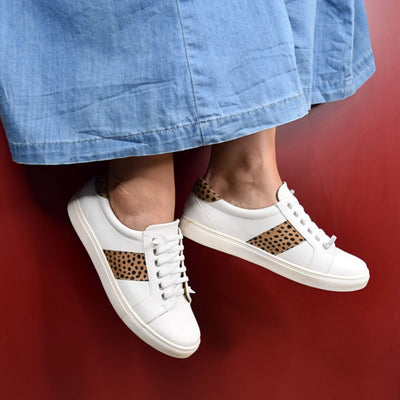 Skale White Leopard by Step on Air | Womens sneakers by  red backdrop 