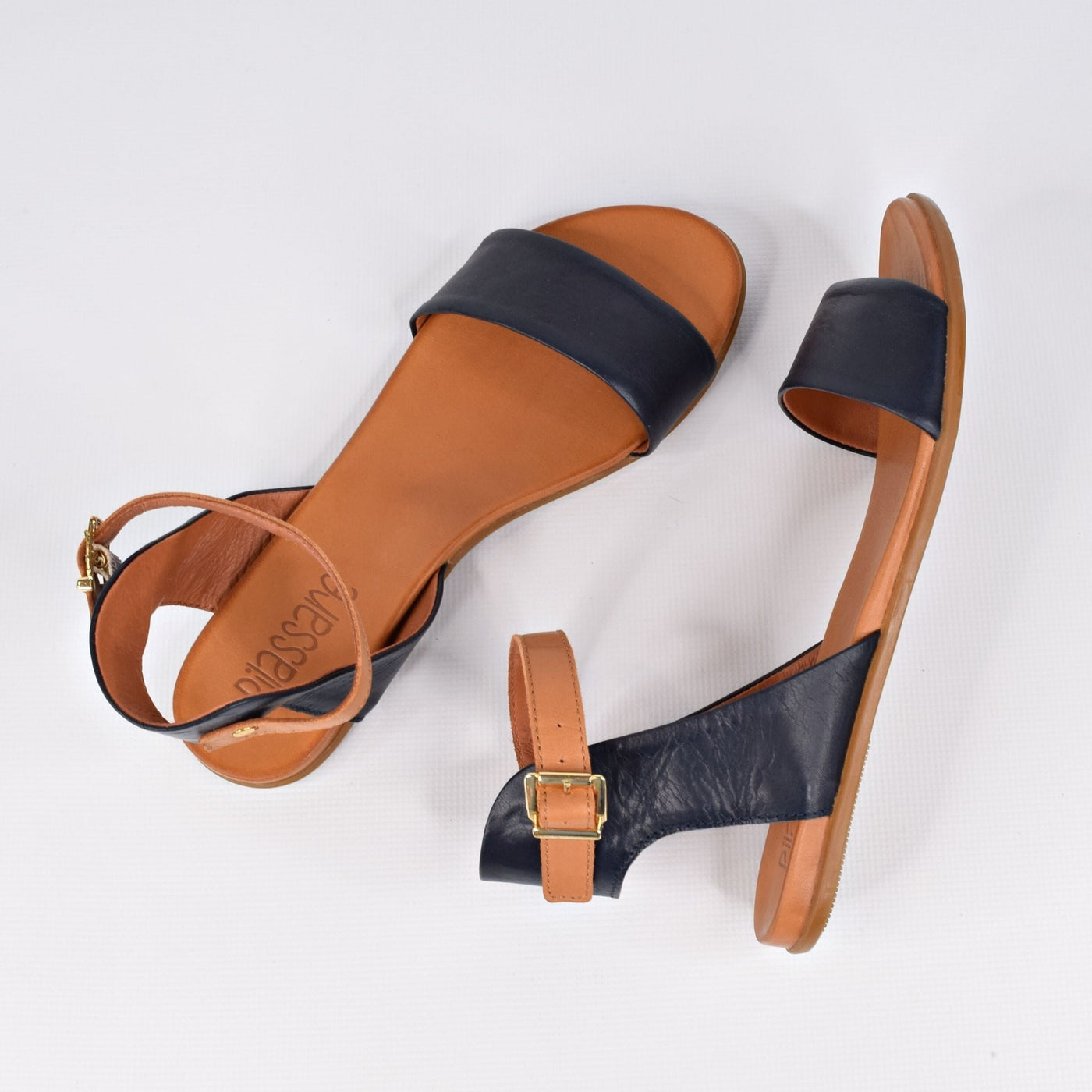 Tangi Navy Tan by Rilassare | Womens plus size sandals by white back drop adjustable ankle strap