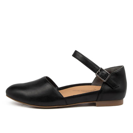 Black leather shoe with a strap on a white background