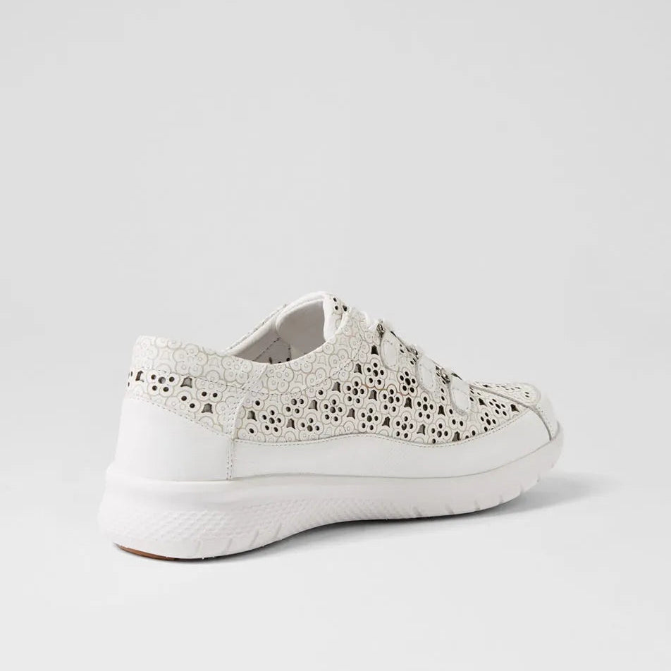 White sneaker with decorative pattern on a light gray background