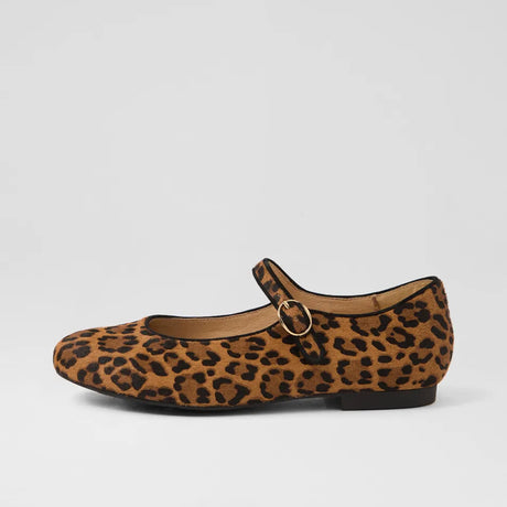 Leopard print flat shoe with a gold buckle on a light gray background