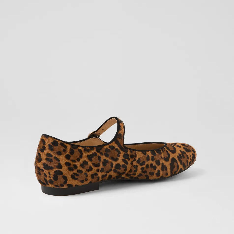 Leopard print flat shoe on a light gray background
